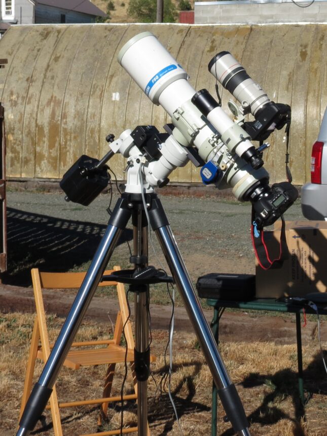 telescopes on an iOptron CEM25 mount and tripod